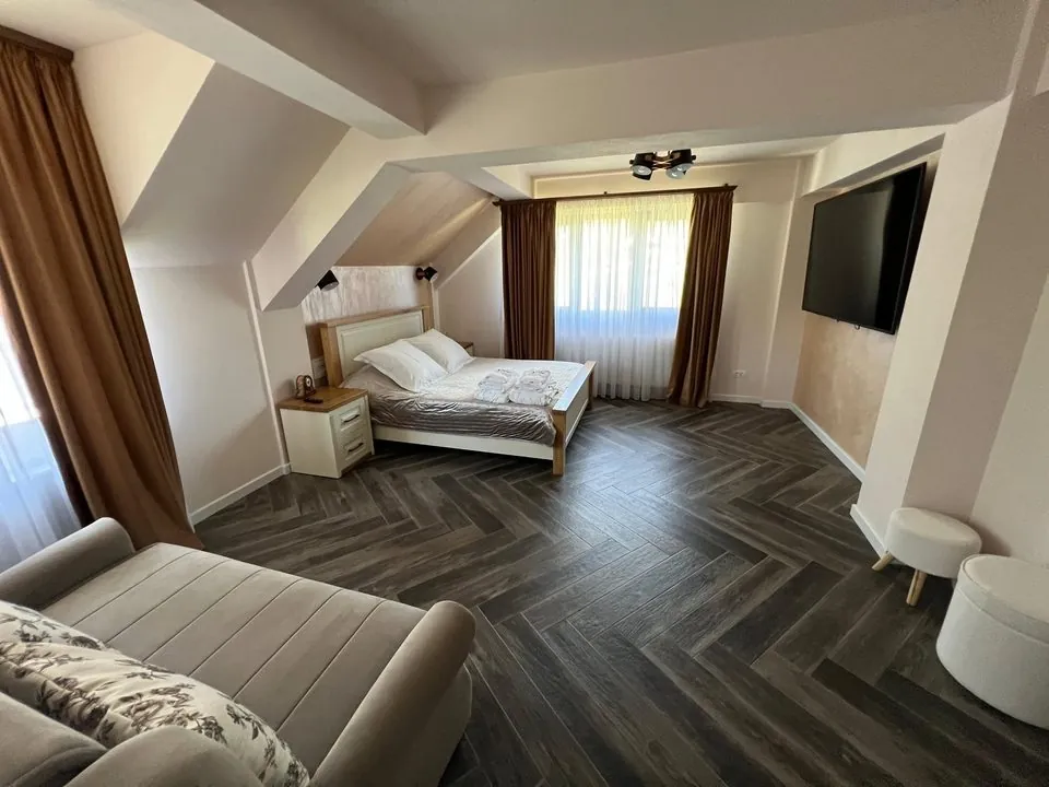 Dormitor cu canapea extensibilă